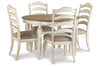 Realyn Dining Table and 4 Chairs